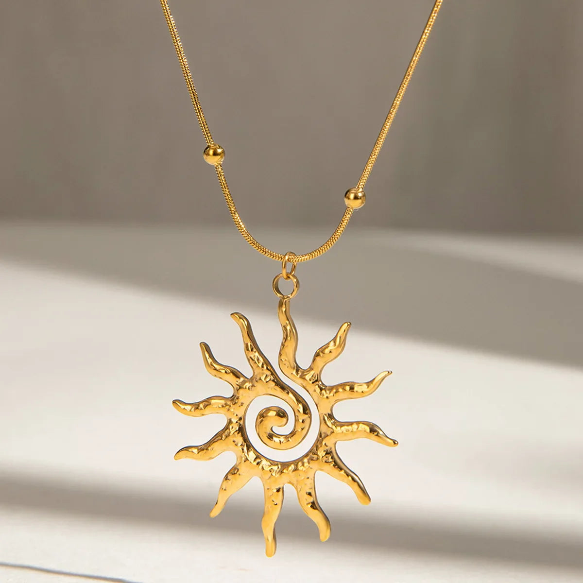 Golden Sun Swirl Pendant Necklace
